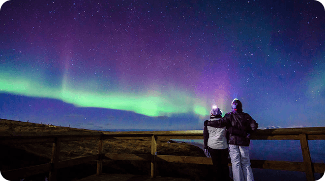 Northern Lights over Iceland mountains
